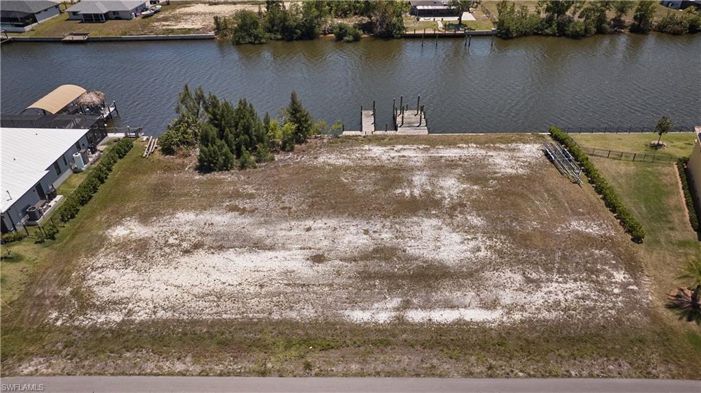 Image 3: Birds eye view of property with a water view