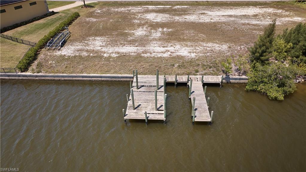 Image 4: View of dock featuring a water view