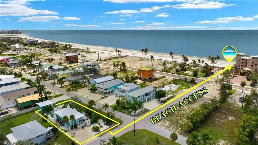 Image 1: Aerial view showcasing beach access  - Virtually Edited Image