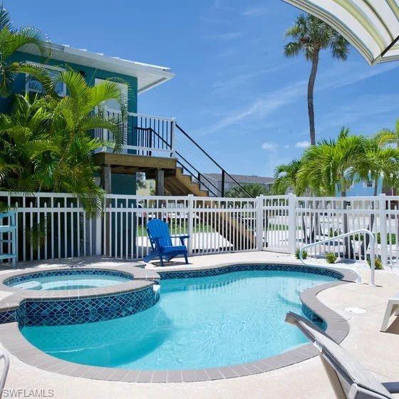 Image 2: View from Private pool and patio area perfect for outdoor living - Virtually Edited Image