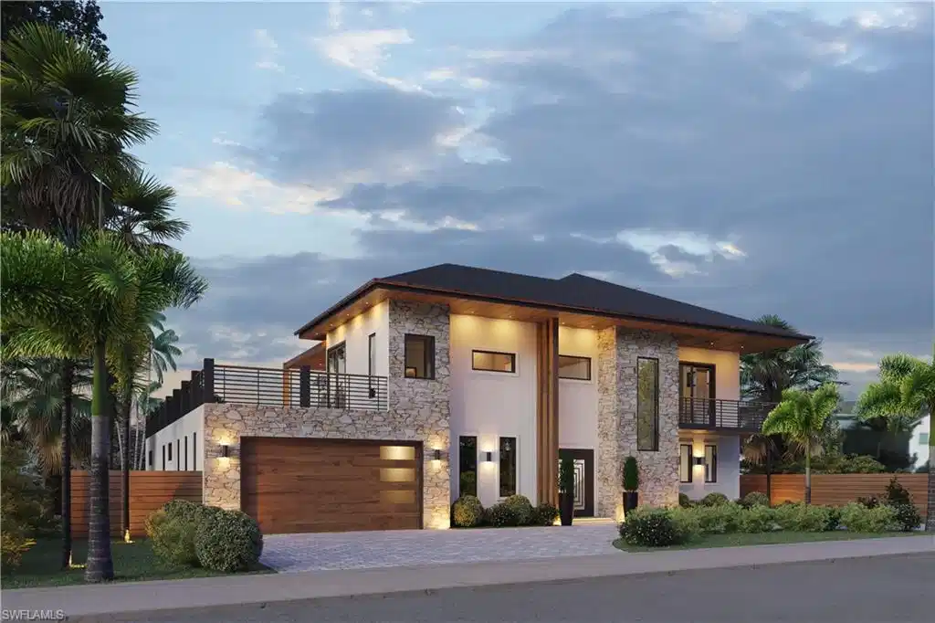 Image 1: Modern home featuring a balcony, stone siding, driveway, and stucco siding