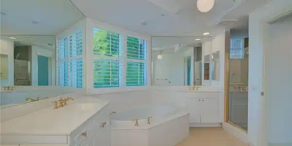 Image 3: Full Principal bath with two vanities, light tile patterned floors, a garden tub, a stall shower, and recessed lighting