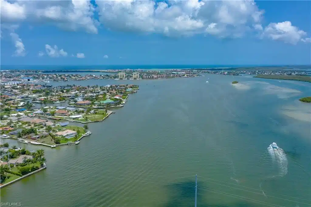 Image 1: Bird's eye view of a nearby body of water