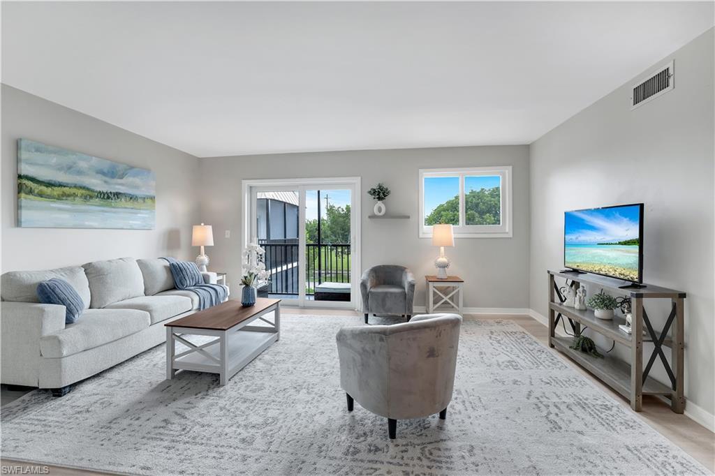 Image 3: Desirable floor plan with a balcony off the living room