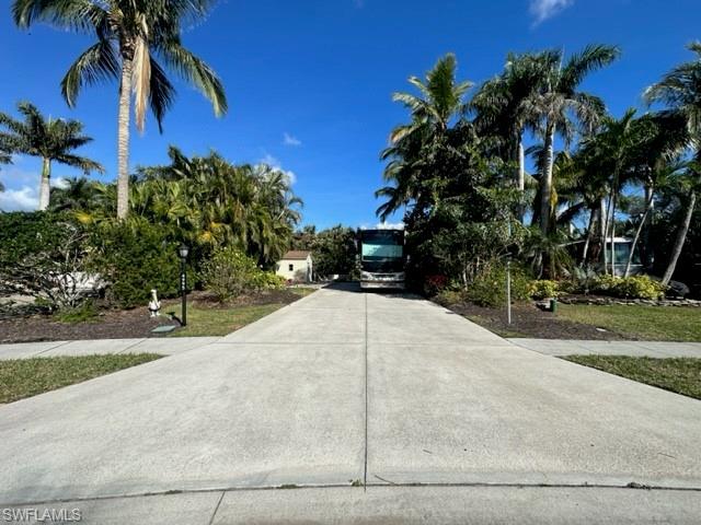 Image 3: View of front of home featuring concrete driveway