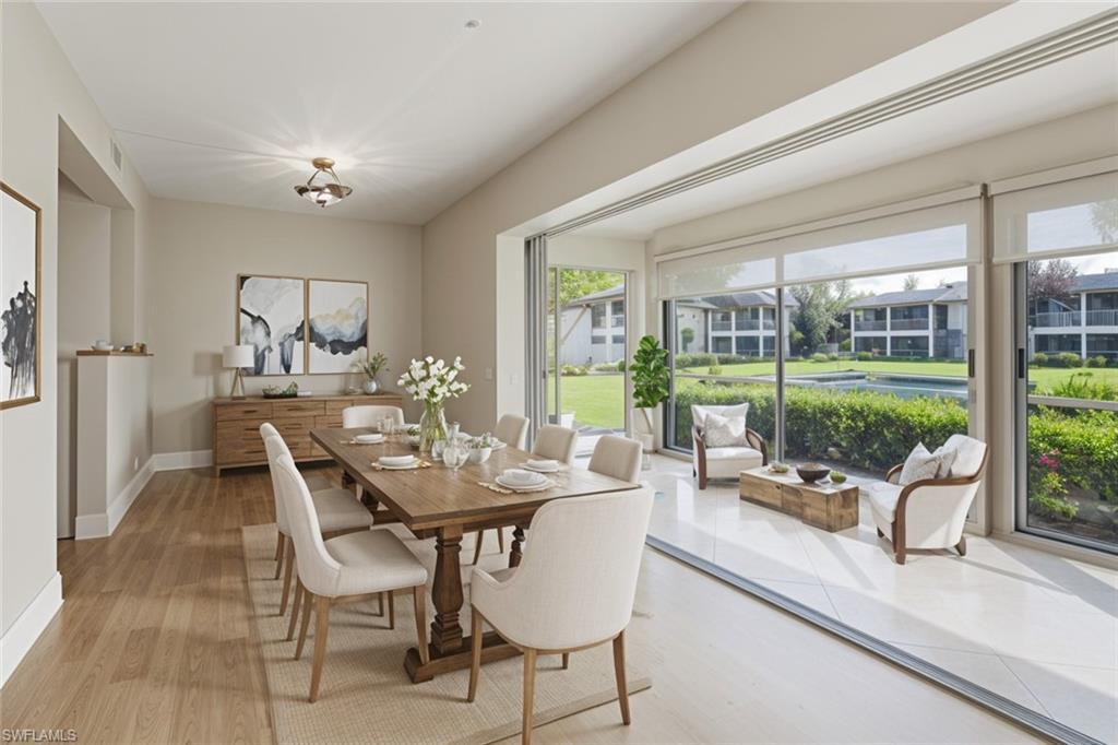 Image 4: Virtually Staged Dining space featuring light wood finished floors and baseboards