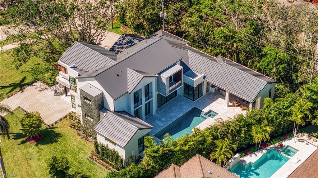 Image 3: View from above of property featuring a pool area