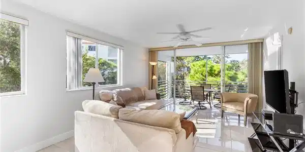 Image 3: The large living area has room for multiple large pieces and still have plenty of wall and traffic space.