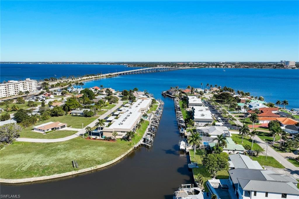 Image 4: Drone / aerial view of a large body of water and a notable bridge
