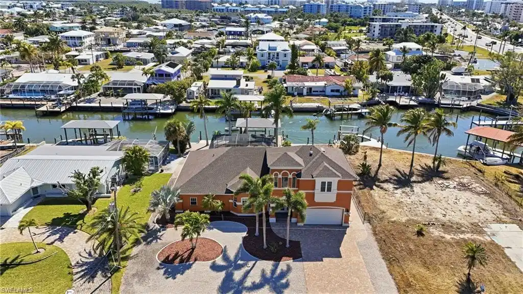 Image 1: View of urban area featuring a nearby body of water - Virtually Edited Image