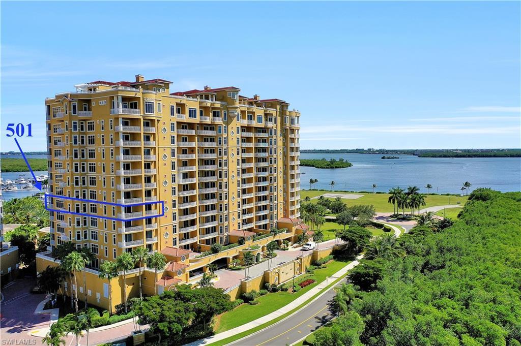 Image 2: View of apartment building / complex with a water view