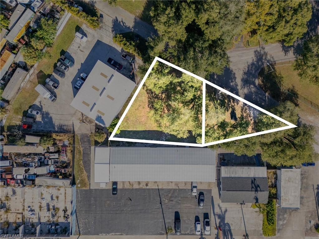 Image 1: Aerial view of property's location featuring property boundaries highlighted