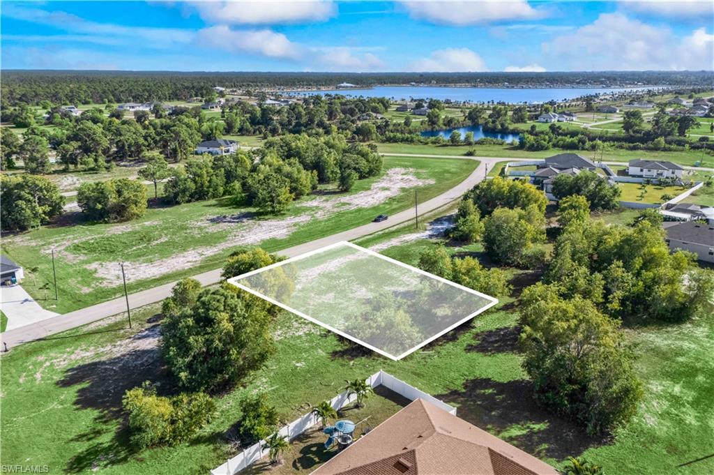 Image 1: Aerial perspective highlighting the full size and potential of the property.