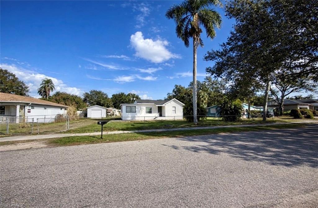 Image 3: View of front of property with a residential view