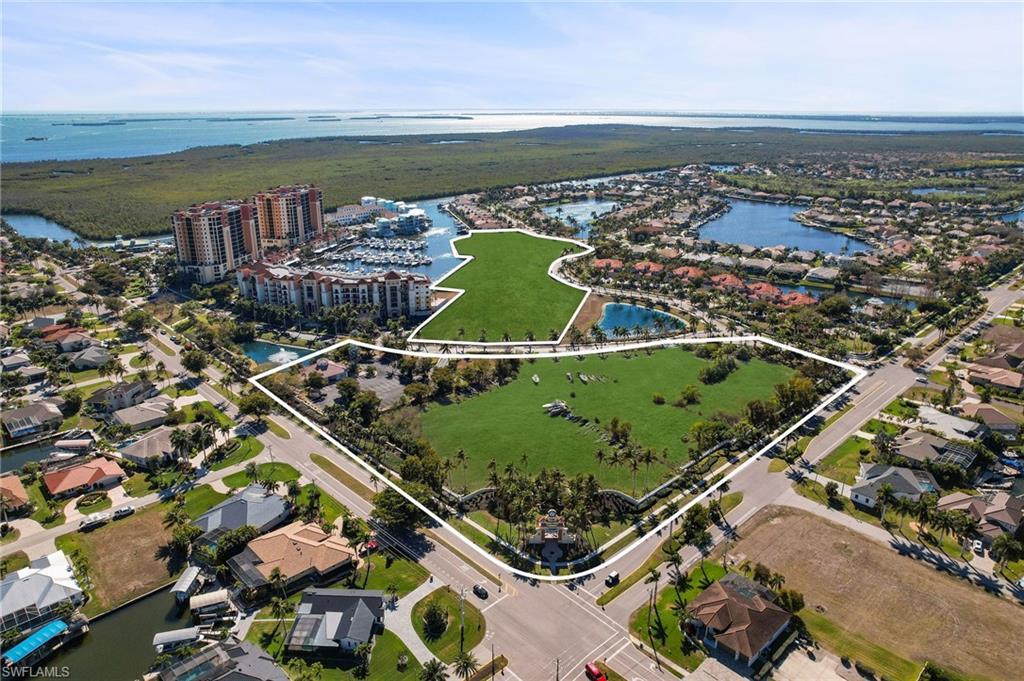 Image 3: Aerial view of property's location with nearby suburban area and property parcel outlined