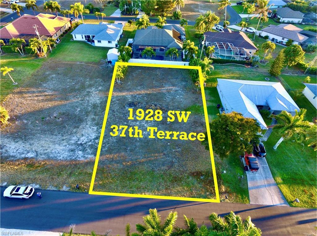Image 3: Aerial perspective of suburban area with property parcel outlined