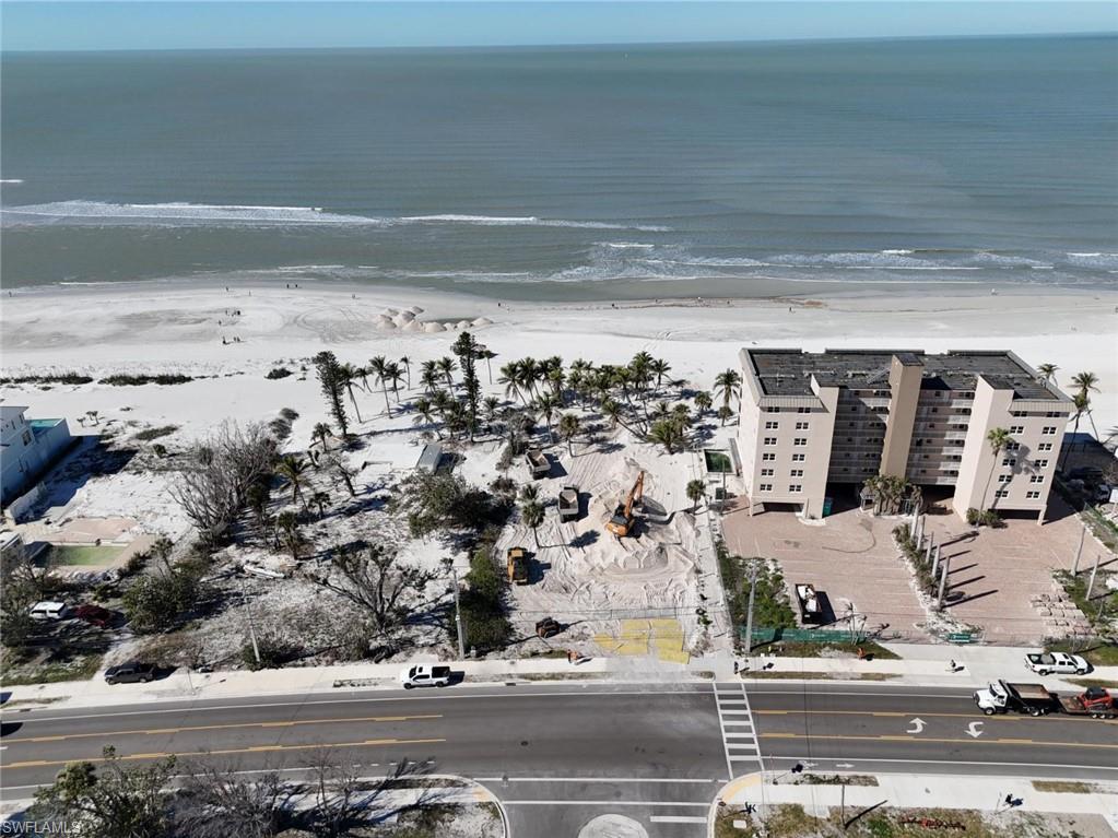 Image 3: Aerial view of property's location featuring a large body of water