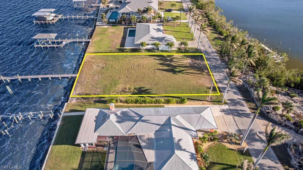 Image 2: Drone / aerial view featuring a water view