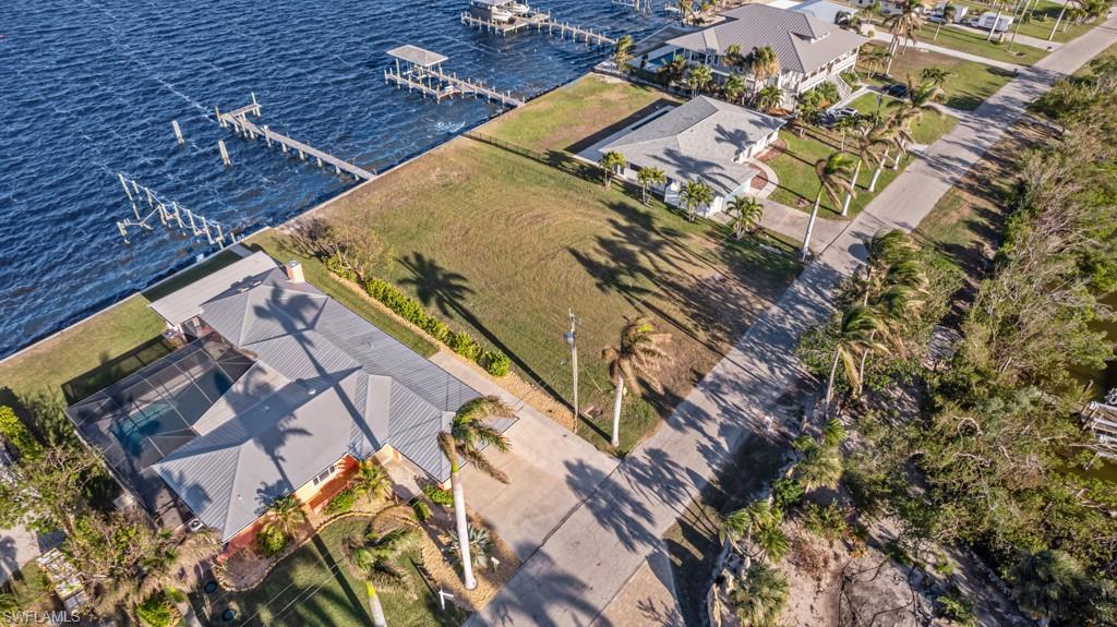 Image 3: Bird's eye view with a water view