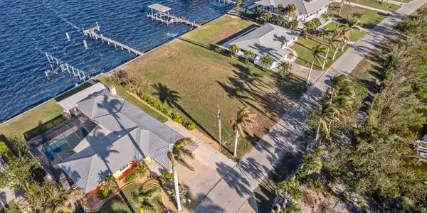 Image 3: Bird's eye view with a water view