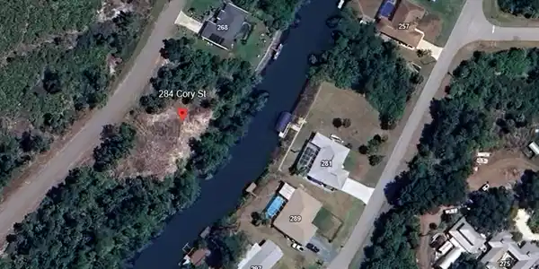 Image 3: Aerial view featuring a water view