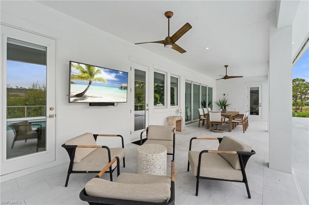 Image 4: Outdoor Dining & Living Room