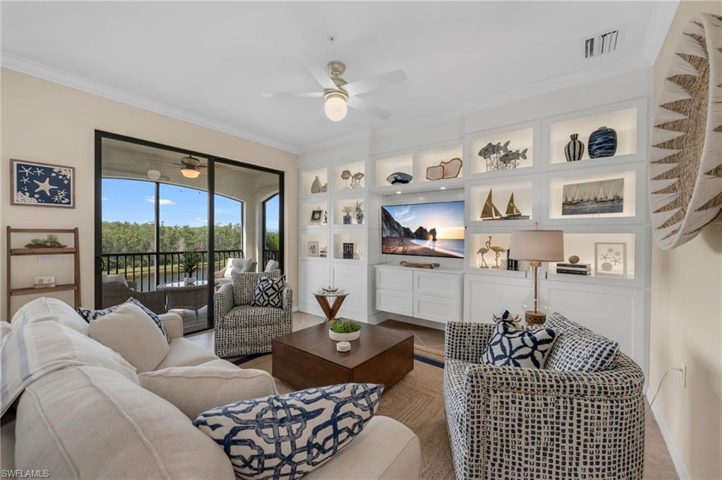 Image 1: Living Room View 1 - Overlooking Lake