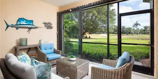 Image 4: Sunroom / solarium featuring an outdoor living space, ceiling fan, and golf course view