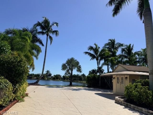 Image 3: View of pool with a water view