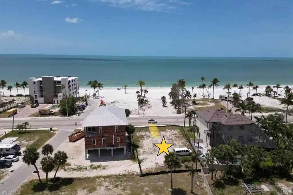Image 1: Water view with local beach