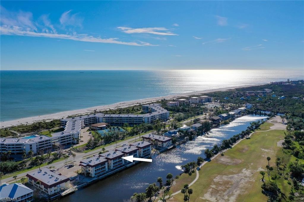 Image 3: Bird's eye view of apartment complex / building and a nearby body of water