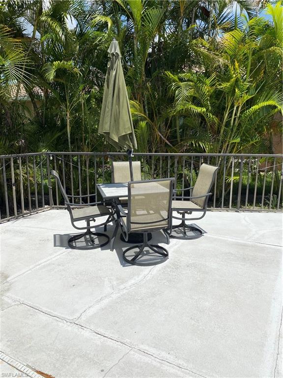 Image 3: View of patio with outdoor dining space