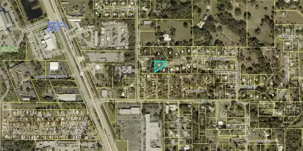 Image 2: Aerial map of property and surrounding area featuring property parcel outlined