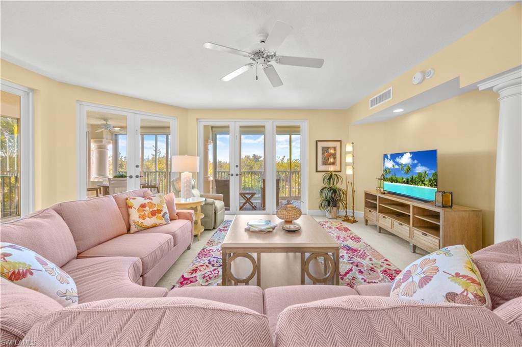 Image 4: Living area featuring ceiling fan and french doors