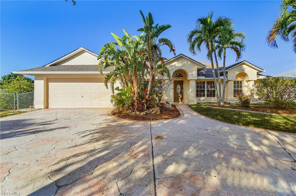 Image 1: Single story home featuring driveway, an attached garage, stucco siding, and roof with shingles