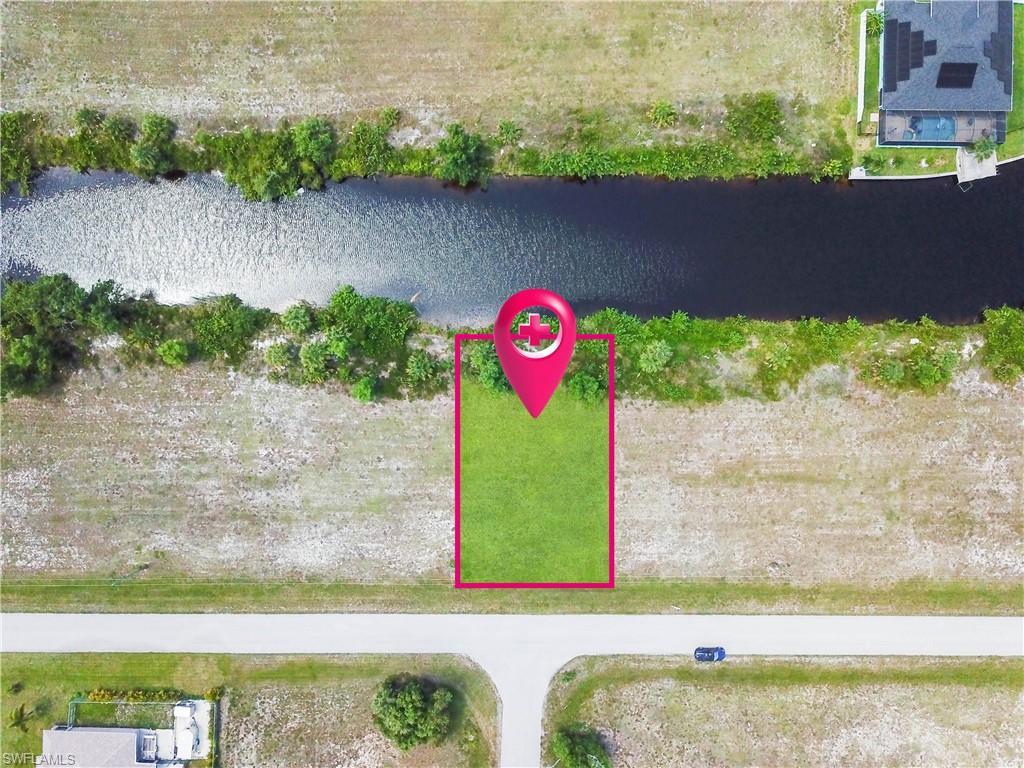 Image 2: Bird's eye view with a water view