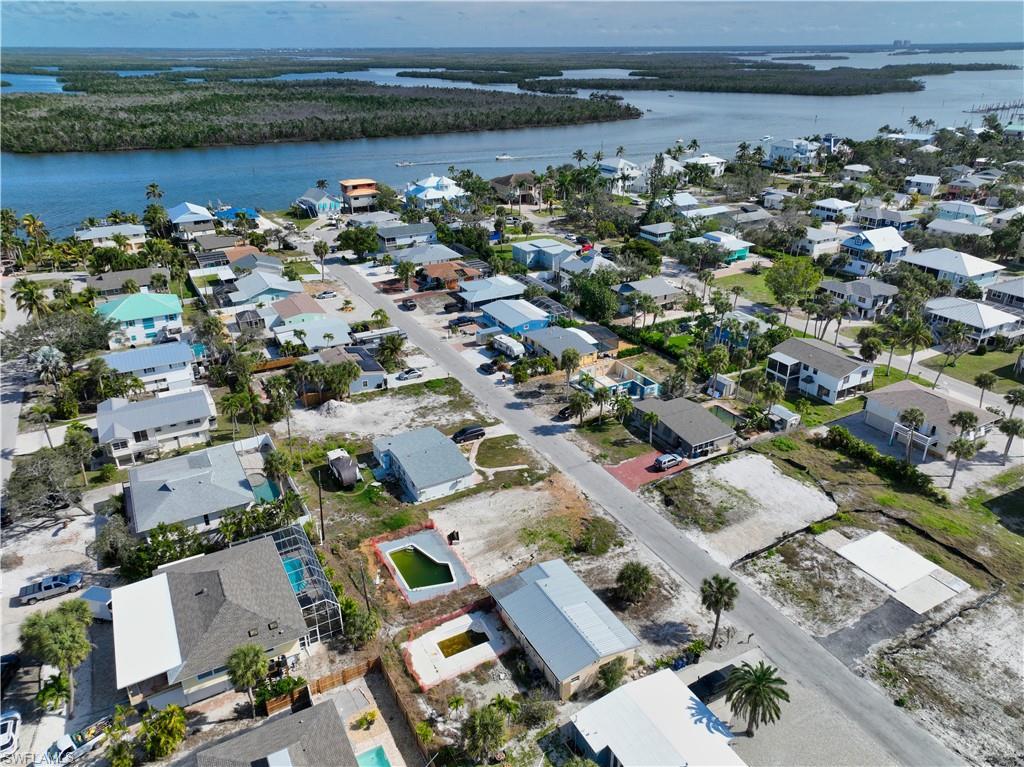 Image 4: Bird's eye view featuring a water view