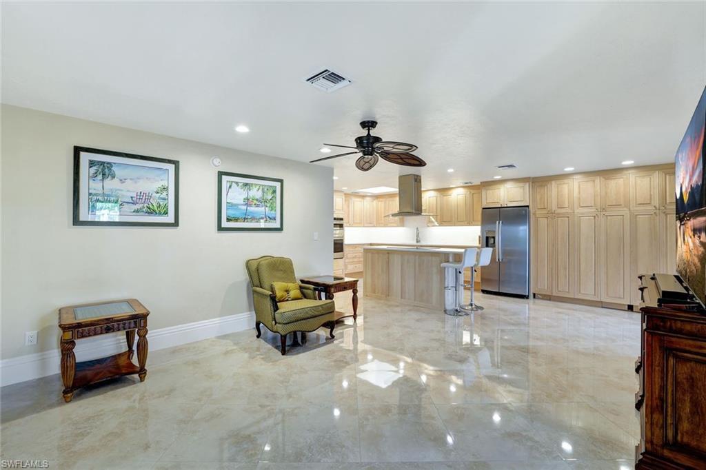 Image 3: Sitting room featuring ceiling fan