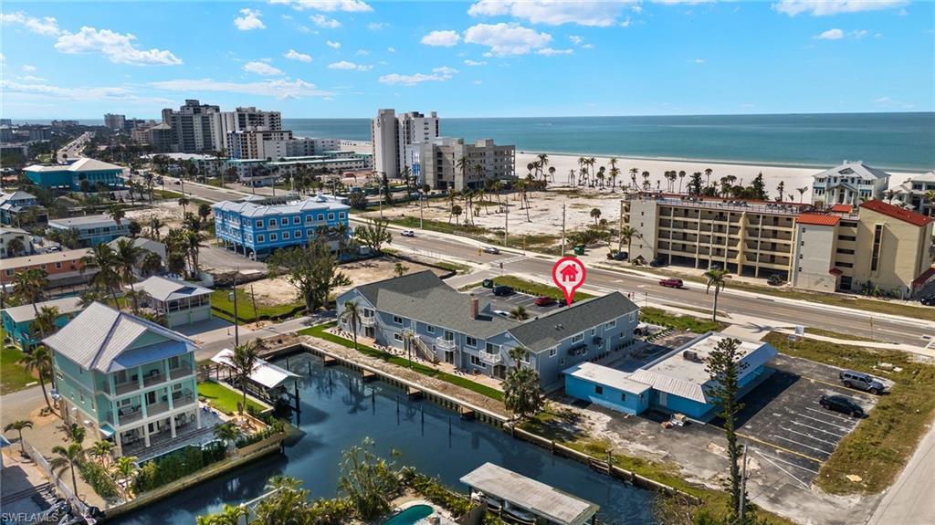 Image 4: Bird's eye view with a water view and a view of city