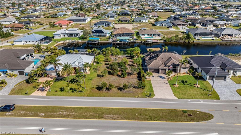 Image 3: Aerial view with a residential view and a water view