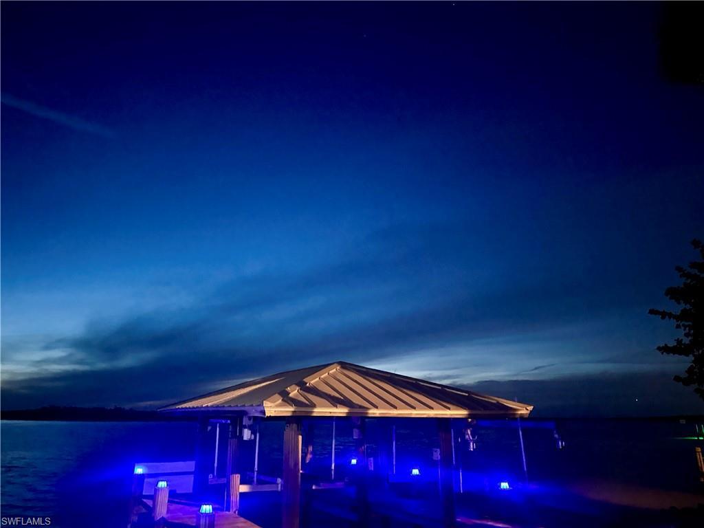 Image 2: Grandfathered Boat House stays with the property and has beautiful ipe wood walkways.