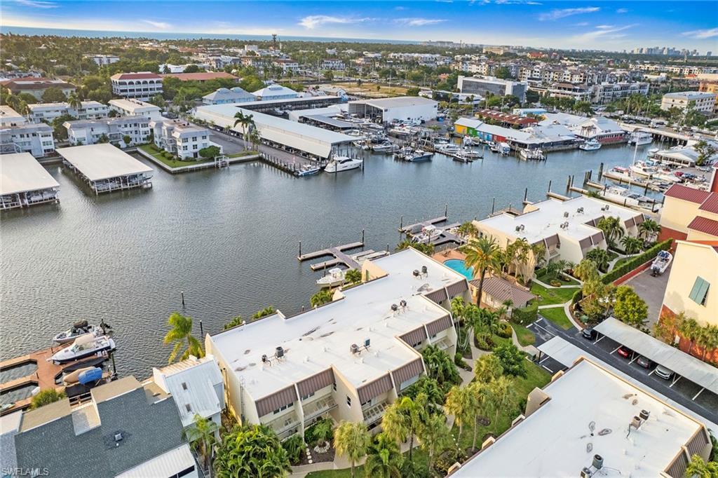 Image 2: Drone / aerial view of a nearby body of water and a marina