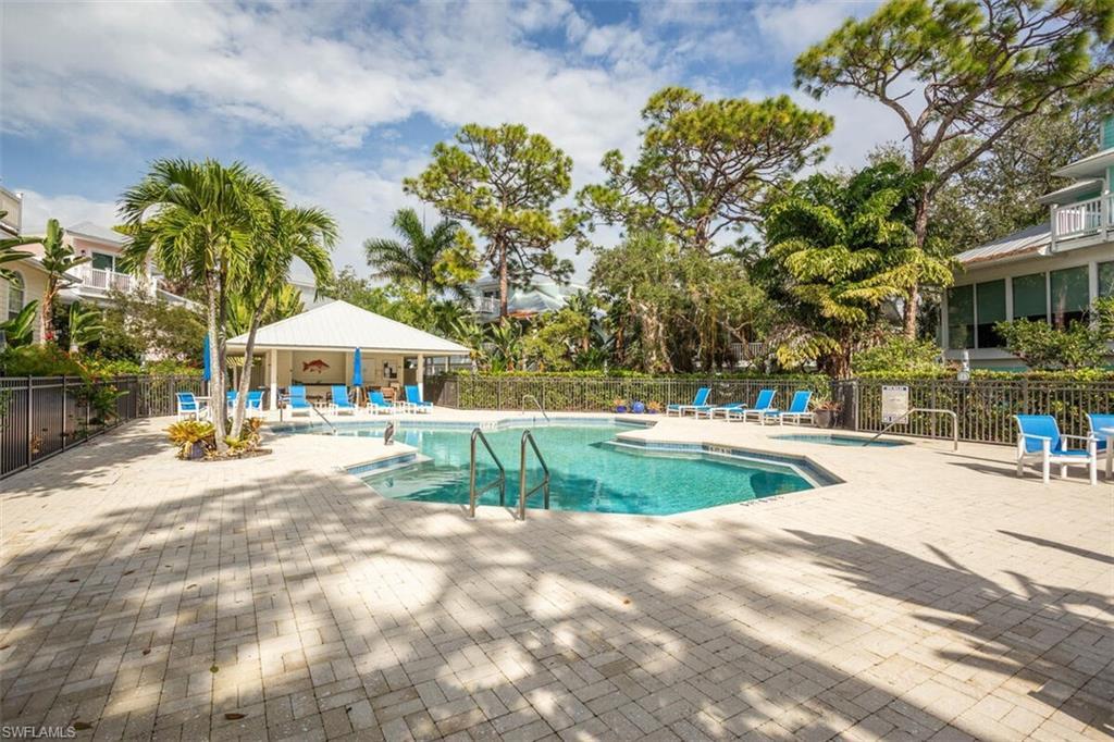 Image 4: Cracker Cove Community pool with a patio