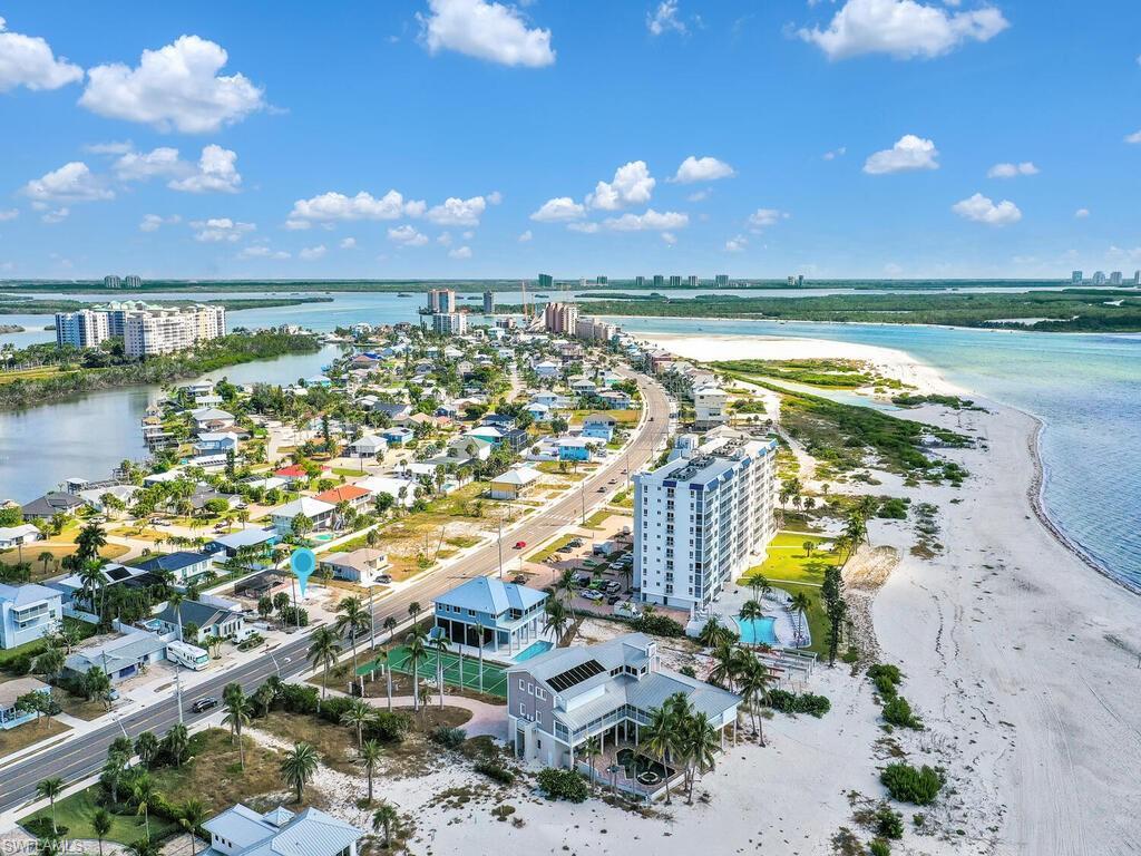 Image 4: View of urban area with a large body of water