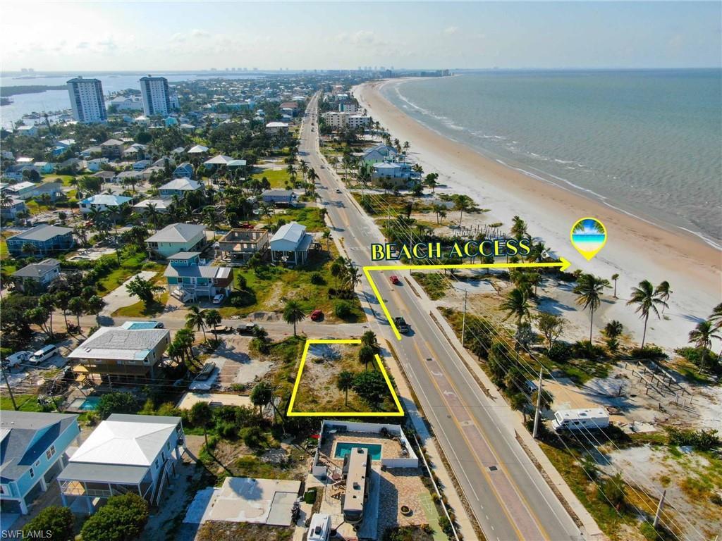 Image 2: Aerial view showing private community beach access