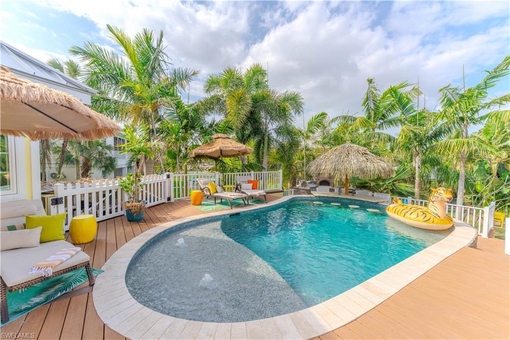 Image 1: Outdoor pool with a deck- Virtually Edited Image