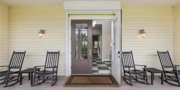 Image 3: Property entrance featuring a porch