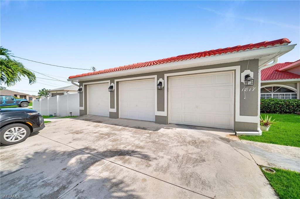 Image 2: Mediterranean / spanish house featuring stucco siding and a tiled roof