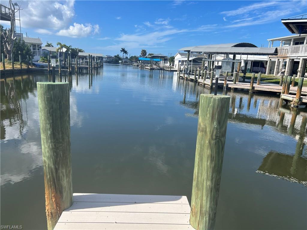 Image 1: Dock area featuring a water view