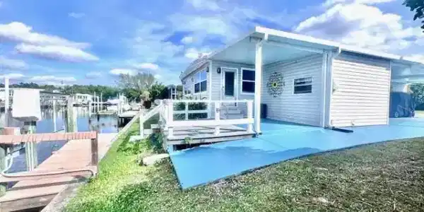 Image 3: Covered Patio and trek deck at waterfront